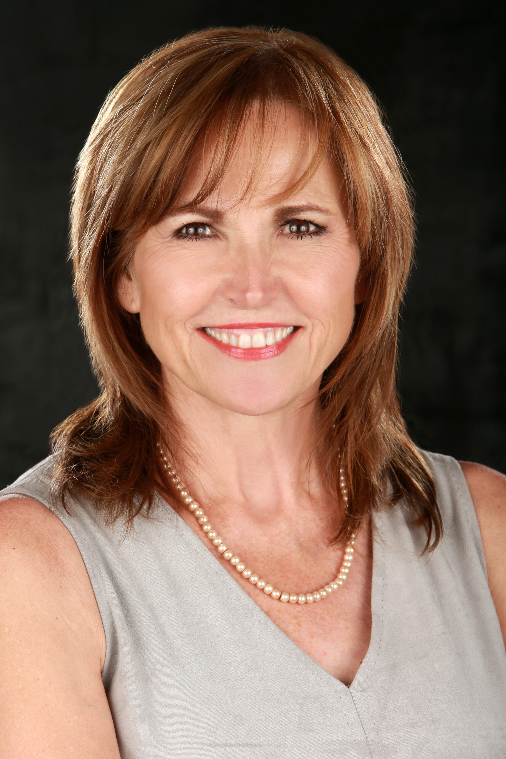 Laura Reed, Broker